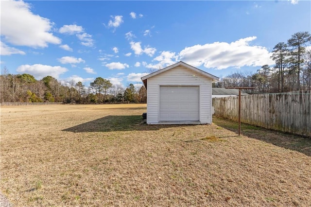 garage with a yard