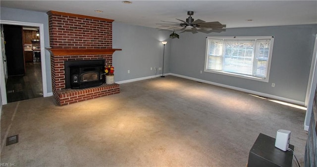 unfurnished living room with ceiling fan and carpet floors