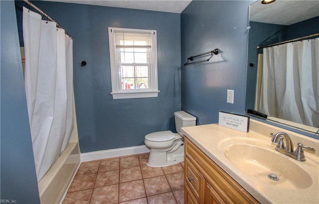 full bathroom featuring shower / bath combination with curtain, tile patterned floors, vanity, and toilet