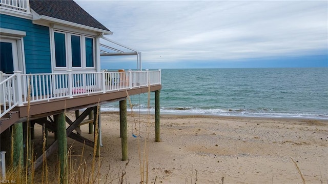 exterior space featuring a beach view