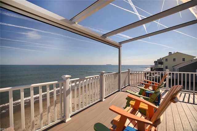 deck featuring a water view