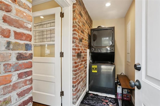 interior space featuring stacked washer / drying machine