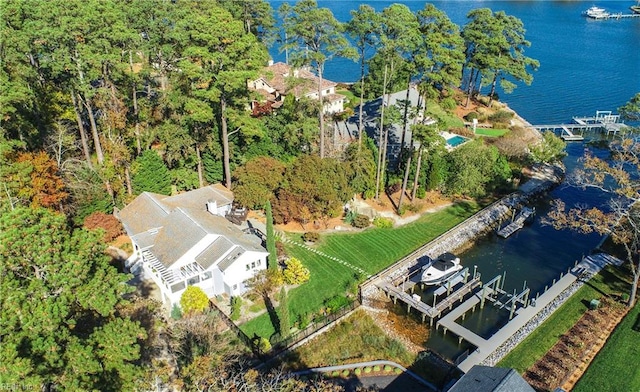 birds eye view of property featuring a water view