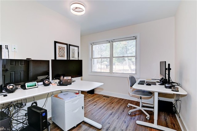 office space featuring dark hardwood / wood-style floors