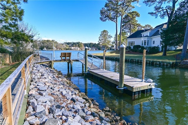 dock area featuring a water view