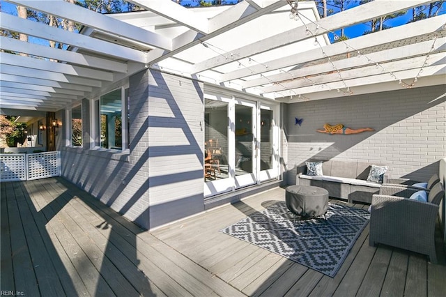 deck featuring an outdoor hangout area and a pergola