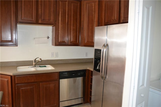 kitchen featuring stainless steel appliances and sink