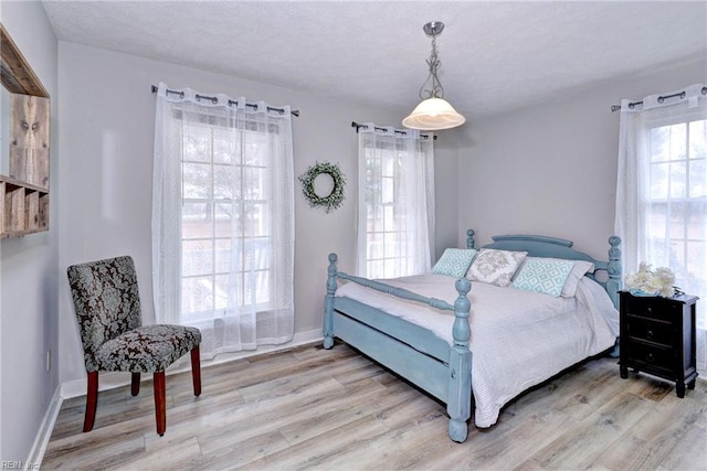 bedroom featuring light hardwood / wood-style floors