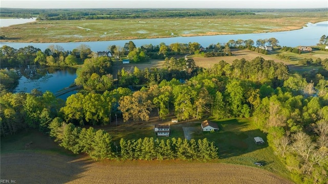 birds eye view of property featuring a rural view and a water view