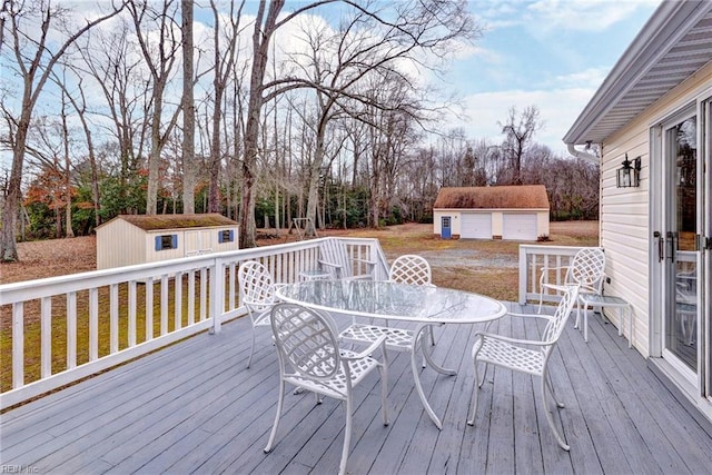 deck with a shed and a lawn