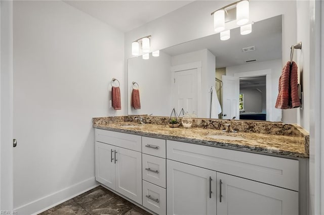 bathroom featuring vanity