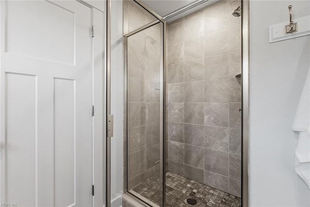 bathroom featuring an enclosed shower