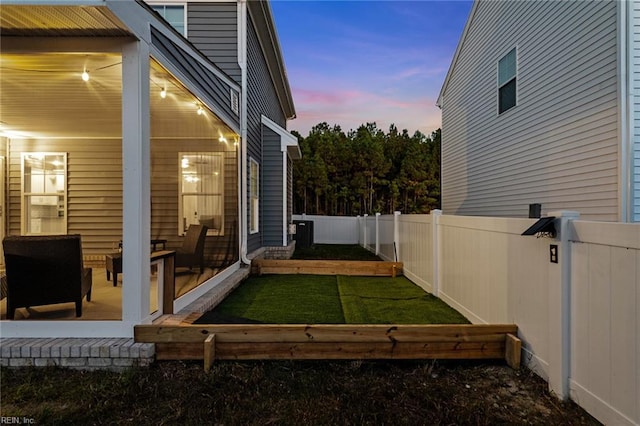 view of property exterior at dusk