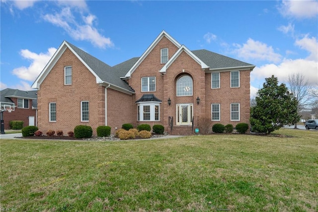 view of front facade with a front lawn