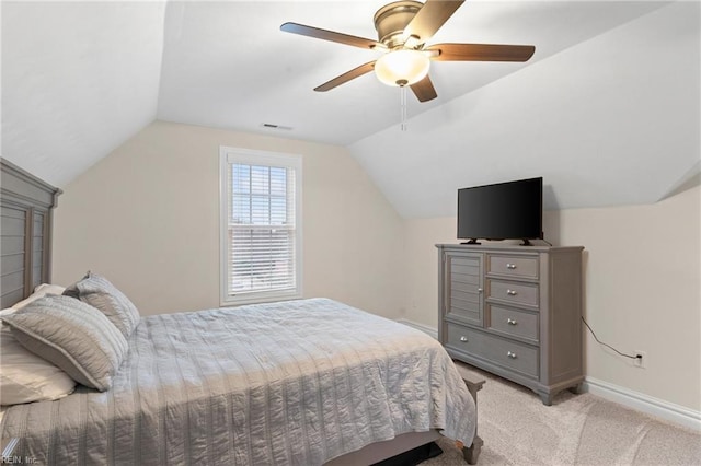 carpeted bedroom featuring vaulted ceiling and ceiling fan