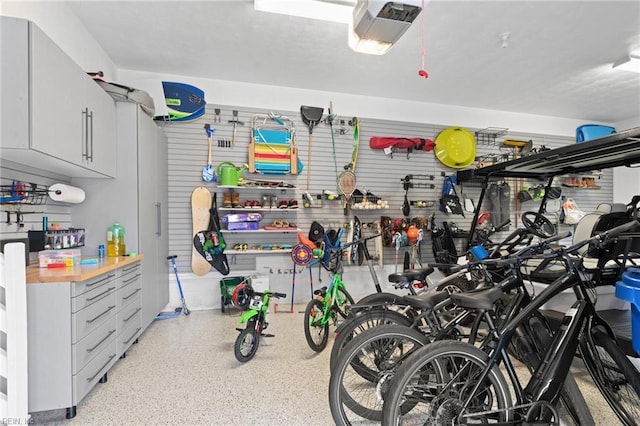 garage featuring a garage door opener