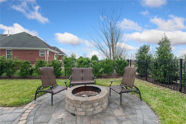 view of patio with an outdoor fire pit