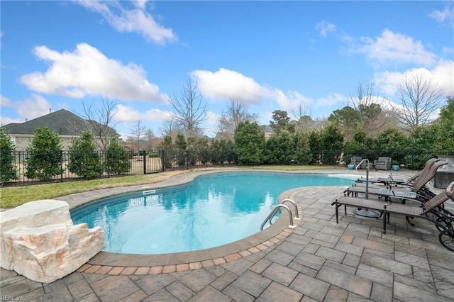 view of pool featuring a patio