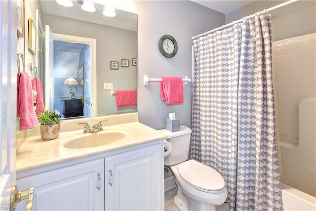 full bathroom featuring vanity, toilet, and shower / tub combo