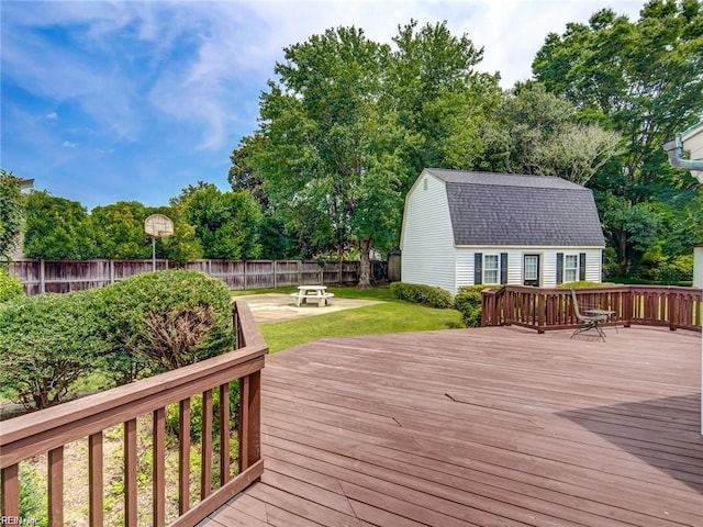 deck featuring a yard