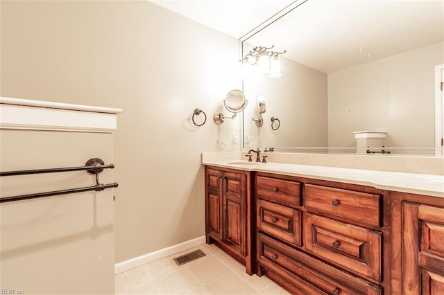 bathroom featuring vanity and tile patterned flooring