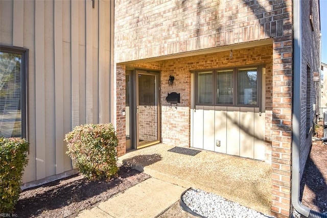 entrance to property with a patio