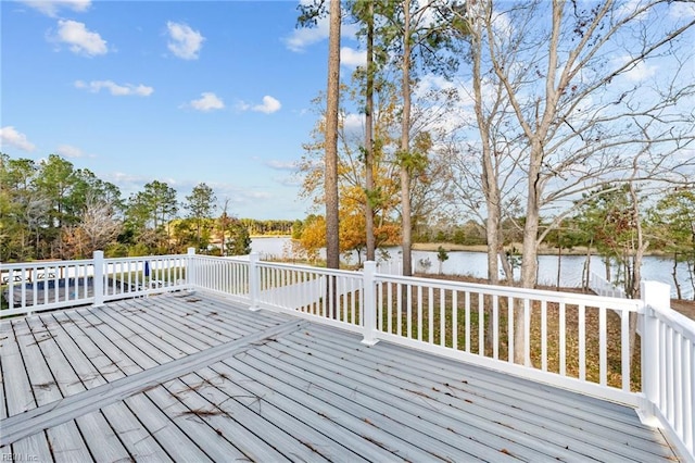 deck featuring a water view