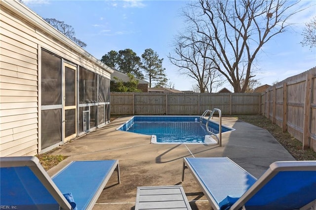 view of pool featuring a patio area