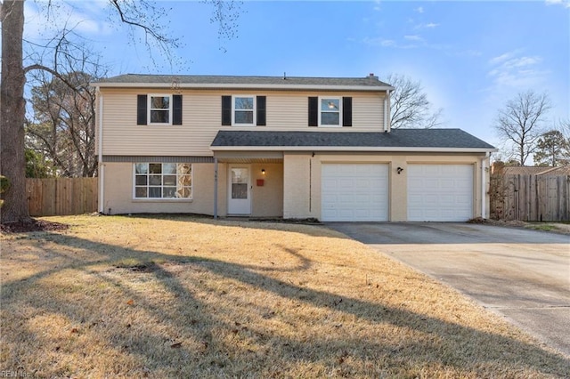 front facade featuring a garage and a front lawn