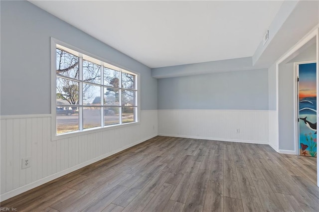 empty room with light wood-type flooring