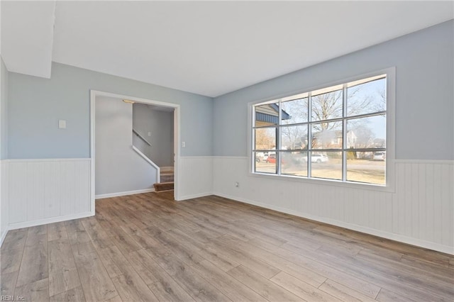 unfurnished room featuring light wood-type flooring