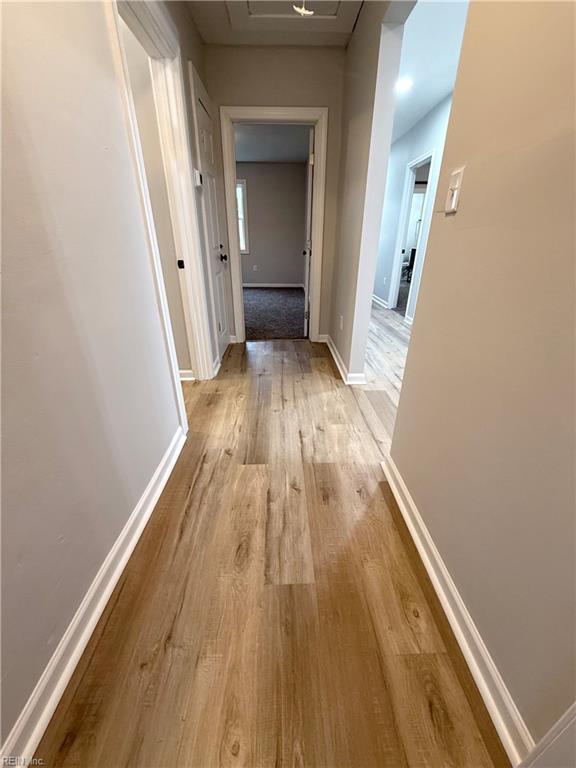 hall featuring light wood-type flooring