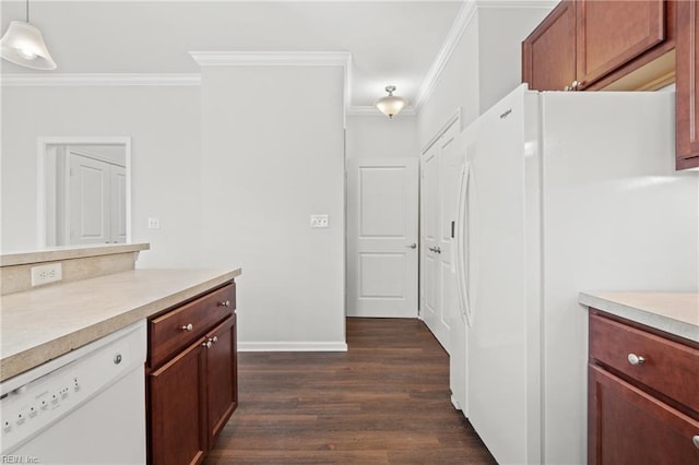 kitchen featuring crown molding, white appliances, dark wood-type flooring, and decorative light fixtures