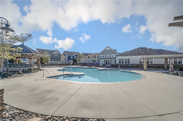 view of pool featuring a patio