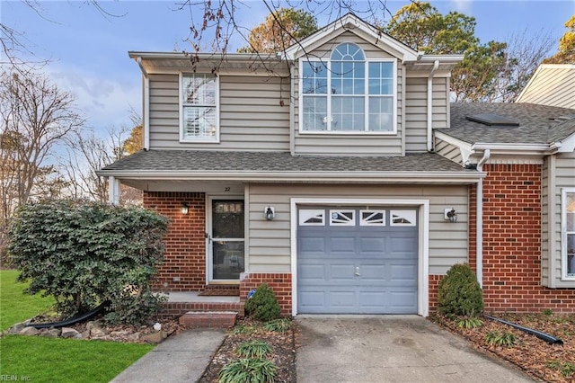 view of front of property featuring a garage