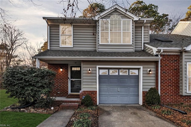 view of front of home with a garage