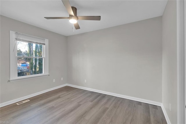 unfurnished room featuring ceiling fan and light hardwood / wood-style flooring