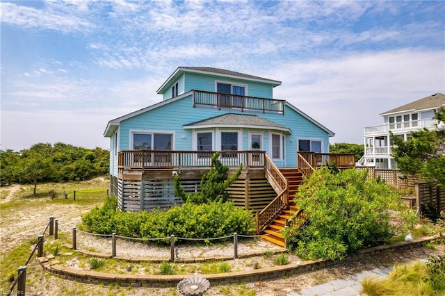 view of front of house featuring a wooden deck