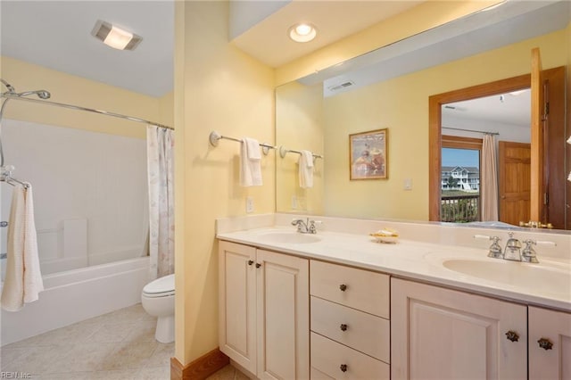 full bathroom with vanity, shower / tub combo, tile patterned floors, and toilet