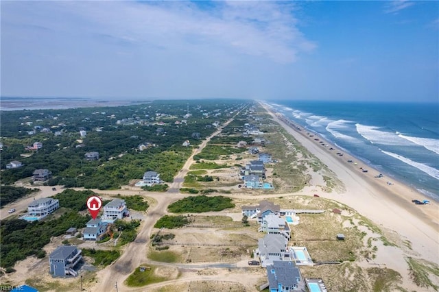 drone / aerial view with a view of the beach and a water view