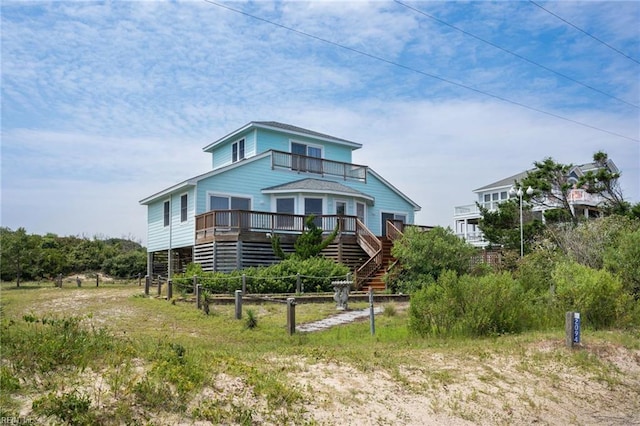 view of front facade featuring a wooden deck