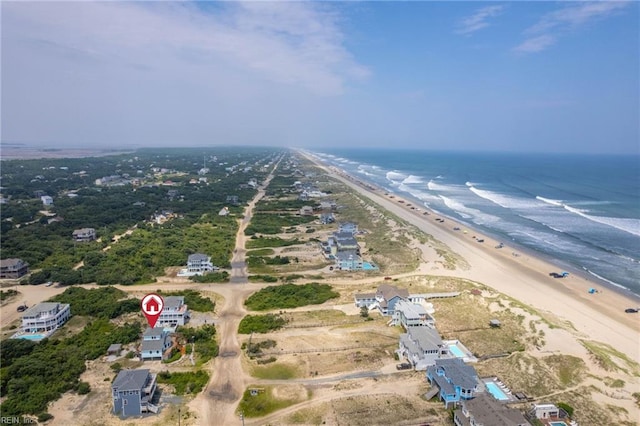 aerial view with a view of the beach and a water view