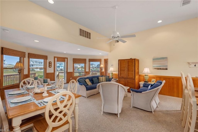 living room featuring ceiling fan and light carpet