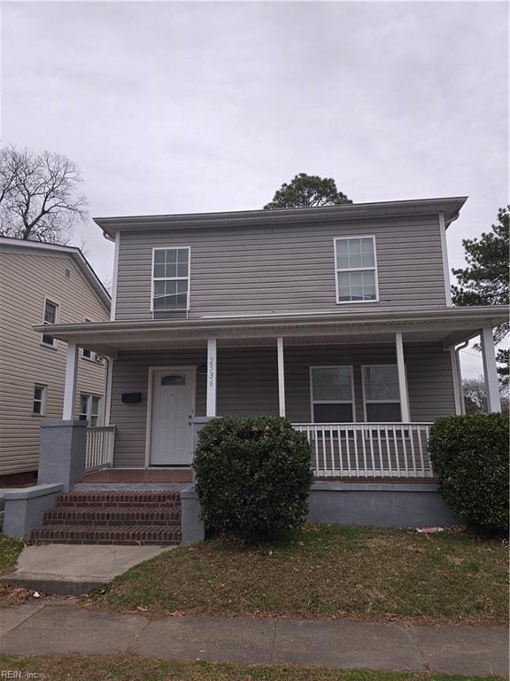 view of front of property featuring covered porch