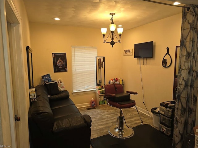 living room featuring hardwood / wood-style flooring and a chandelier