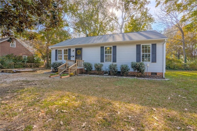 view of front of home with a front yard