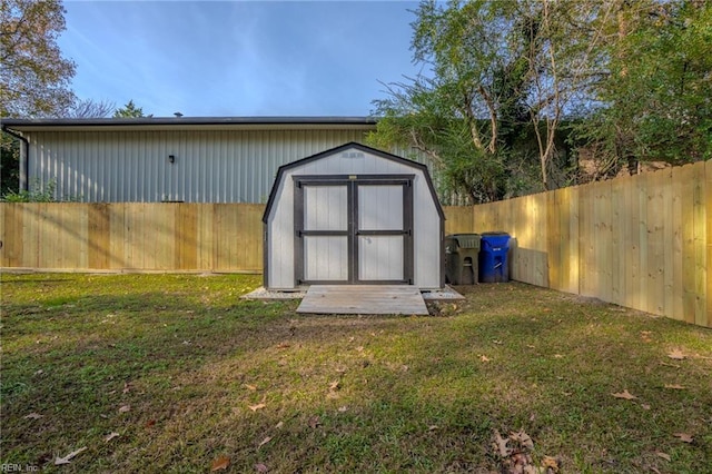 view of outdoor structure with a lawn