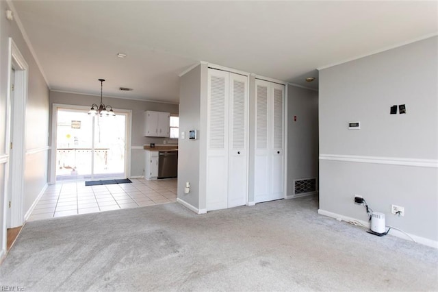 interior space with ornamental molding, light carpet, and an inviting chandelier