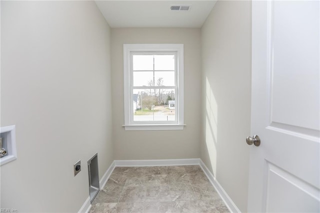 laundry area with hookup for a washing machine and hookup for an electric dryer