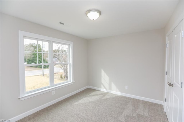 empty room featuring carpet